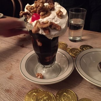Peter Luger - Home made whip cream in a sundae with chocolate coins. Definitely worth getting. - Steakhouses Near Me - Brooklyn, New York