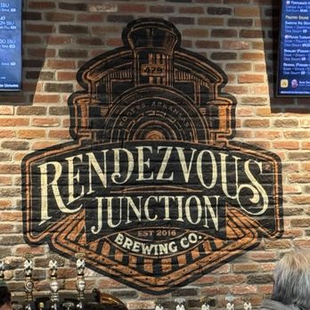 Rendezvous Junction Brewing - Brick behind bar - Breweries Near Me - Rogers, Arkansas