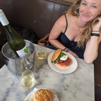 Baker & Commons - Biscuit Breakfast Sandwich, Poached Egg Sandwich and a bottle of NZ Sauvignon Blanc - Cafes Near Me - Berkeley, California