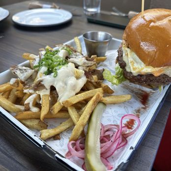 Batch & Brine - Burger with fried egg and bacon with sides of duck confit Duck & Cheese Fries - Burgers Near Me - Lafayette, California