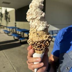 Handel's Homemade Ice Cream - Horchata and coffee ice cream with a chocolate dipped waffle cone with nuts