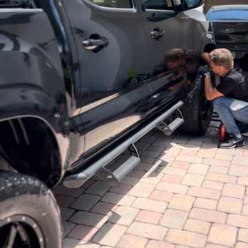 MAD Auto detailing - Owner and detailer, Eric, detailing wheels of Toyota Tacoma as part of MAD Diamond package. - Auto Detailing Near Me - Davie, Florida MAD Auto detailing - Owner and detailer, Eric, detailing wheels of Toyota Tacoma as part of MAD Diamond package. - Auto Detailing Near Me - Davie, Florida
