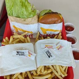 Left: Hamburger, protein style with extra lettuce; Right: Cheeseburger. Double fries! Left: Hamburger, protein style with extra lettuce; Right: Cheeseburger. Double fries!