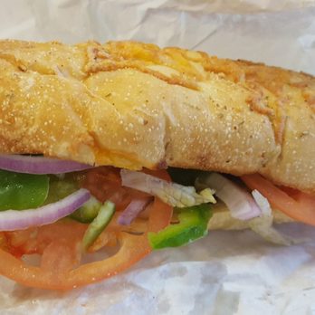 Subway - a sub sandwich with tomato, lettuce, and onions - Sandwiches Near Me - Winchester, Kentucky Subway - a sub sandwich with tomato, lettuce, and onions - Sandwiches Near Me - Winchester, Kentucky