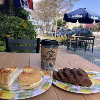 Birdcage Coffee House - Vanilla Latte, Parmesan Cream Cheese Bagel, and warm chocolate muffin - Coffee & Tea Near Me - Long Beach, California Birdcage Coffee House - Vanilla Latte, Parmesan Cream Cheese Bagel, and warm chocolate muffin - Coffee & Tea Near Me - Long Beach, California
