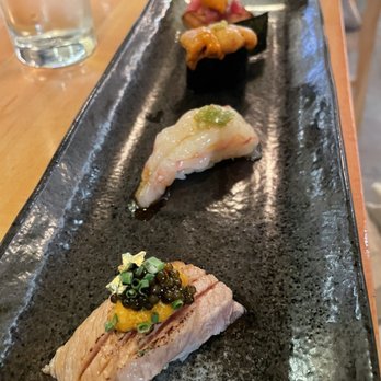 Sushi Lin Brooklyn Heights - three sushis on a black plate - Sushi Bars Near Me - Brooklyn, New York Sushi Lin Brooklyn Heights - three sushis on a black plate - Sushi Bars Near Me - Brooklyn, New York