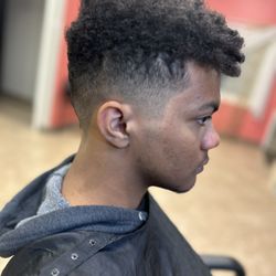 Charmaine’s Beauty Bar - Faded curly cut