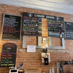 menus on a brick wall
