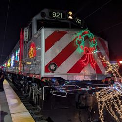 Caltrain Station - Mountain View - Holiday Caltrain. You can't get on it. Santa and helpers visit selected stations 1st full wknd in Dec. Carolers, faux snow machine, too!
