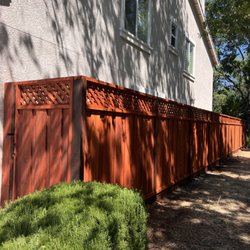 Rojo's Fences - 7ft fence board and board with privacy lattice and sealer protection.