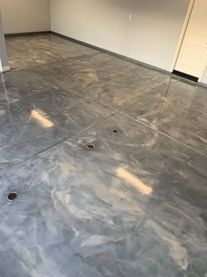Metallic Epoxy 1 - Brand new home we diamond ground and added a metallic epoxy coating!