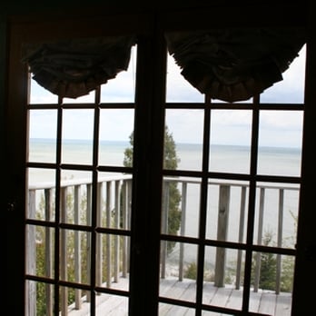 At The Waters Edge B&B - Door looking out of Northwoods Suite (Photo Copyright: at the Water's Edge - from website) - Bed & Breakfast Near Me - Algoma, Wisconsin At The Waters Edge B&B - Door looking out of Northwoods Suite (Photo Copyright: at the Water's Edge - from website) - Bed & Breakfast Near Me - Algoma, Wisconsin