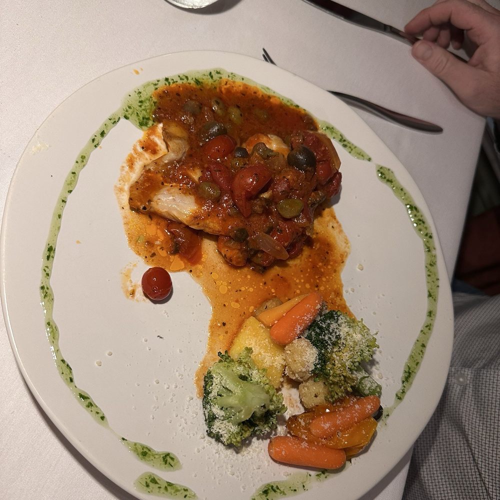 Grouper with olive red sauce Grouper with olive red sauce