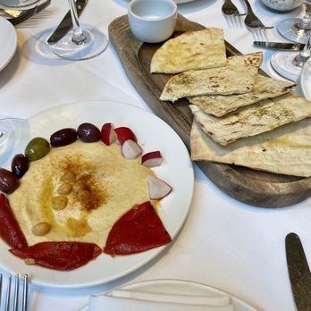 Avra Rockefeller Center - Complimentary hummus and pita plate - Greek Near Me - New York, New York Avra Rockefeller Center - Complimentary hummus and pita plate - Greek Near Me - New York, New York