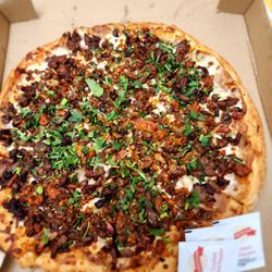 Central Pizza - Mexican Pizza- Cheese, Refried beans, Carne Asada, Bacon, Jalapeños, and  Cilantro