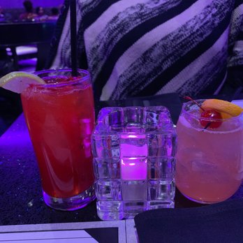 SoBe Restaurant and Lounge - Pomerita drink and the peach on the rocks - American Near Me - Lanham, Maryland