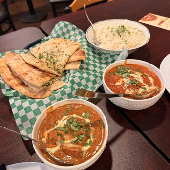 Flavors Junction - 2 portions of garlic nann, rice, garlic chicken (L), & chicken tikka (R) - Indian Near Me - San Jose, California Flavors Junction - 2 portions of garlic nann, rice, garlic chicken (L), & chicken tikka (R) - Indian Near Me - San Jose, California
