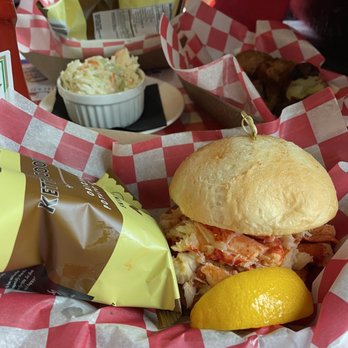 Hazel's - Lobster roll, coleslaw, gluten free bun in the foreground of the photo . - Bars Near Me - Birmingham, Michigan Hazel's - Lobster roll, coleslaw, gluten free bun in the foreground of the photo . - Bars Near Me - Birmingham, Michigan