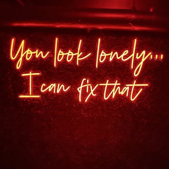 The Devil's Drink - New neon sign at the foot of stairs - Cocktail Bars Near Me - Denver, Colorado