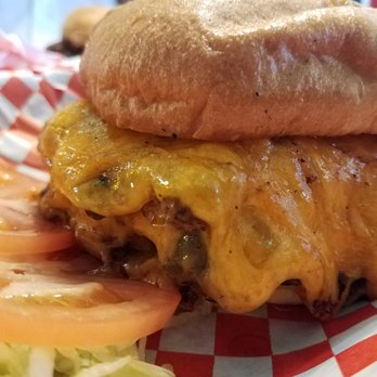 Nicky Ds Crowley - Stuffed burger. Somehow, though, everything ended up on the outside. - Burgers Near Me - Crowley, Texas