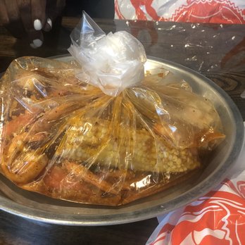 Two Claws - Snow Crab Legs, shrimp, corn, and potato in bag. - Cajun/Creole Near Me - Bear, Delaware Two Claws - Snow Crab Legs, shrimp, corn, and potato in bag. - Cajun/Creole Near Me - Bear, Delaware