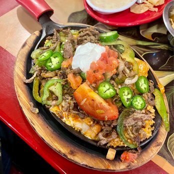 Dos De Oros - Fajitas enchiladas steak. Added fresh jalapeños. - Mexican Near Me - Kansas City, Missouri Dos De Oros - Fajitas enchiladas steak. Added fresh jalapeños. - Mexican Near Me - Kansas City, Missouri