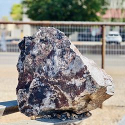 AZ Rock Depot - Up close of premium boulder with green tree background