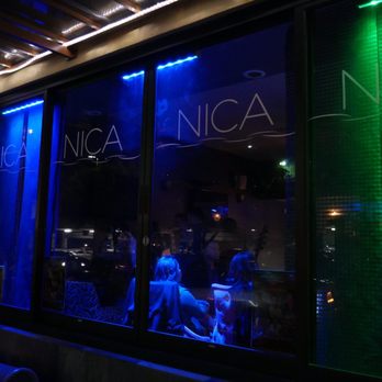 Nica Lounge - a window with neon lights - Lounges Near Me - Concord, California