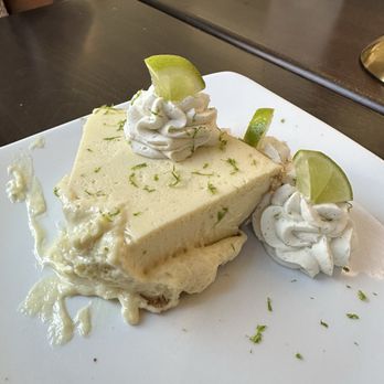 Claw & Hammer - Believe it or not, the Suit brought this piece of Keylime pie out just like this. Though delicious, the presentation is poor. - Seafood Near Me - Newport, Rhode Island Claw & Hammer - Believe it or not, the Suit brought this piece of Keylime pie out just like this. Though delicious, the presentation is poor. - Seafood Near Me - Newport, Rhode Island
