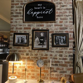 The Vintage Speakeasy - a brick wall with a sign above it - Speakeasies Near Me - Orlando, Florida The Vintage Speakeasy - a brick wall with a sign above it - Speakeasies Near Me - Orlando, Florida