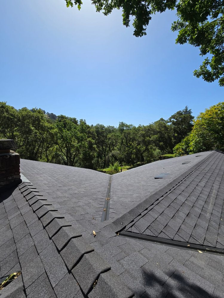 Slide of Green Group Roofing