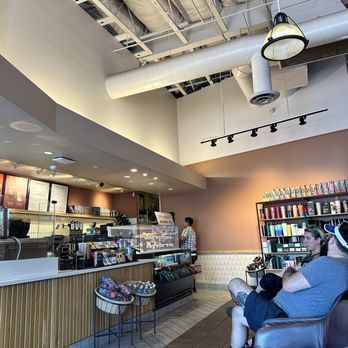 Starbucks - a man sitting in a chair in a coffee shop - Coffee & Tea Near Me - Cathedral City, California Starbucks - a man sitting in a chair in a coffee shop - Coffee & Tea Near Me - Cathedral City, California