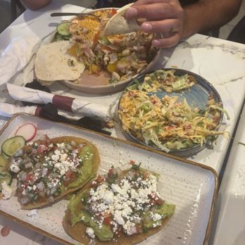 Taco & Margarita - Tostados! As you can tell we loved every bite of it with the fajitas in the back lol - Mexican Near Me - Montreal, Quebec Taco & Margarita - Tostados! As you can tell we loved every bite of it with the fajitas in the back lol - Mexican Near Me - Montreal, Quebec