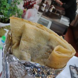 Crepes de Paris - My simple dessert Crêpe- butter, cinnamon, sugar, that's it. Wrapped up to-go, walk and nibble.