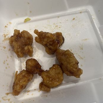 Panda Express - That's how much orange chicken is got from the scoop, SAD - Chinese Near Me - Logan, Utah