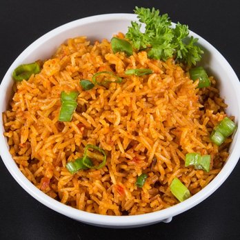 Blessinglicious - a bowl of rice and vegetables - African Near Me - Toronto, Ontario Blessinglicious - a bowl of rice and vegetables - African Near Me - Toronto, Ontario