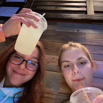 Miller's Ale House - Faith Messersmith and Leah Randolph drinking, 'Minute Maid lemonade' and 'some kinda of raspberry tea' out of plastic children's cups - Sports Bars Near Me - Lutz, Florida Miller's Ale House - Faith Messersmith and Leah Randolph drinking, 'Minute Maid lemonade' and 'some kinda of raspberry tea' out of plastic children's cups - Sports Bars Near Me - Lutz, Florida