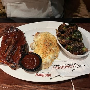 LongHorn Steakhouse - 9oz. Parmesan Crusted Chicken with Half-Rack Baby Back Ribs - Steakhouses Near Me - Troy, Michigan LongHorn Steakhouse - 9oz. Parmesan Crusted Chicken with Half-Rack Baby Back Ribs - Steakhouses Near Me - Troy, Michigan