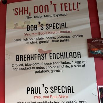Duran Central Pharmacy - The image shows a menu board with a red border and white background, titled 'SHH, DON'T TELL!' indicating a hidden menu. It lists three items: Bob's Special, Breakfast Enchilada, and Paul's Special, each with detailed descriptions of ingredients and options. The menu emphasizes secrecy and features locally inspired dishes such as enchiladas and tortillas. - Mexican Near Me - Albuquerque, New Mexico