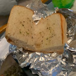 Hawkins Grill & Pizzeria - That's garlic bread... that's garlic bread? Theres literally drops of garlic no garlic at all.
