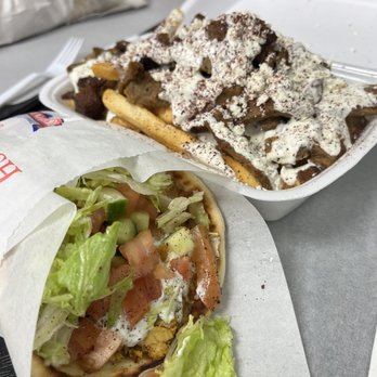 Gyro Flame - Chicken shawarma and Gyro Flame Fries. I don't know how I fit all of this inside my body in one sitting, but it happened. - Vegetarian Near Me - Auburn, Washington
