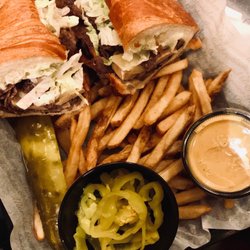Grinders Above &  Beyond - Steak Croissant (Asked for Hot peppers on the side) Ordered fries with Honey Mustard. Came with a pickle!
