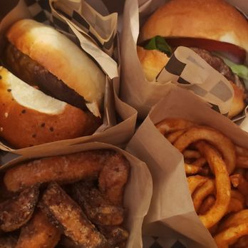 The Burger Joint - Arcata - Burger combos - one with sweet potato fries and the other with curly fries. - Burgers Near Me - Arcata, California