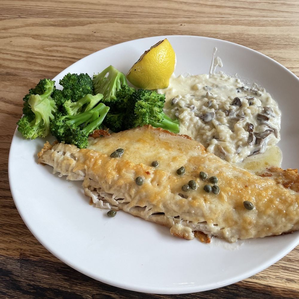 Junction Bar & Grill - Parmesan sautéed walleye with mushroom risotto - American Near Me - Walloon Lake, Michigan Junction Bar & Grill - Parmesan sautéed walleye with mushroom risotto - American Near Me - Walloon Lake, Michigan