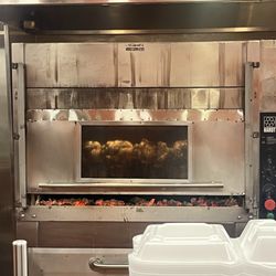 Peruvian Charcoal Chicken - The delicious chicken cooked over the charcoals.
