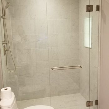 Fast Glass - Custom glass door and non movable glass walls in a marble shower. - Auto Glass Services Near Me - Carson City, Nevada