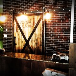 The Hat's Olive Tap - Our sliding barn door.