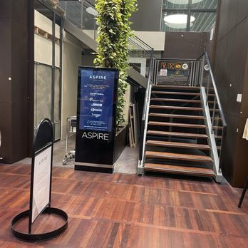 Aspire Business Lounge - Entrance going upstairs, across from the La Place cafe - Airport Lounges Near Me - Kastrup, 84