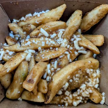 Odd Burger - Poutine! Crispy fries smothered in vegan gravy and sprinkled with vegan cheese - Vegan Near Me - Toronto, Ontario Odd Burger - Poutine! Crispy fries smothered in vegan gravy and sprinkled with vegan cheese - Vegan Near Me - Toronto, Ontario