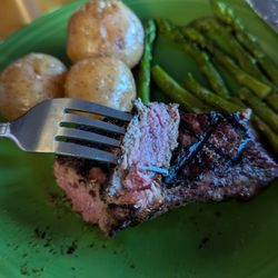 Jack Russell Steak House & Brewery - NY Strip house cut 12 oz steak with asparagus and roasted potatoes